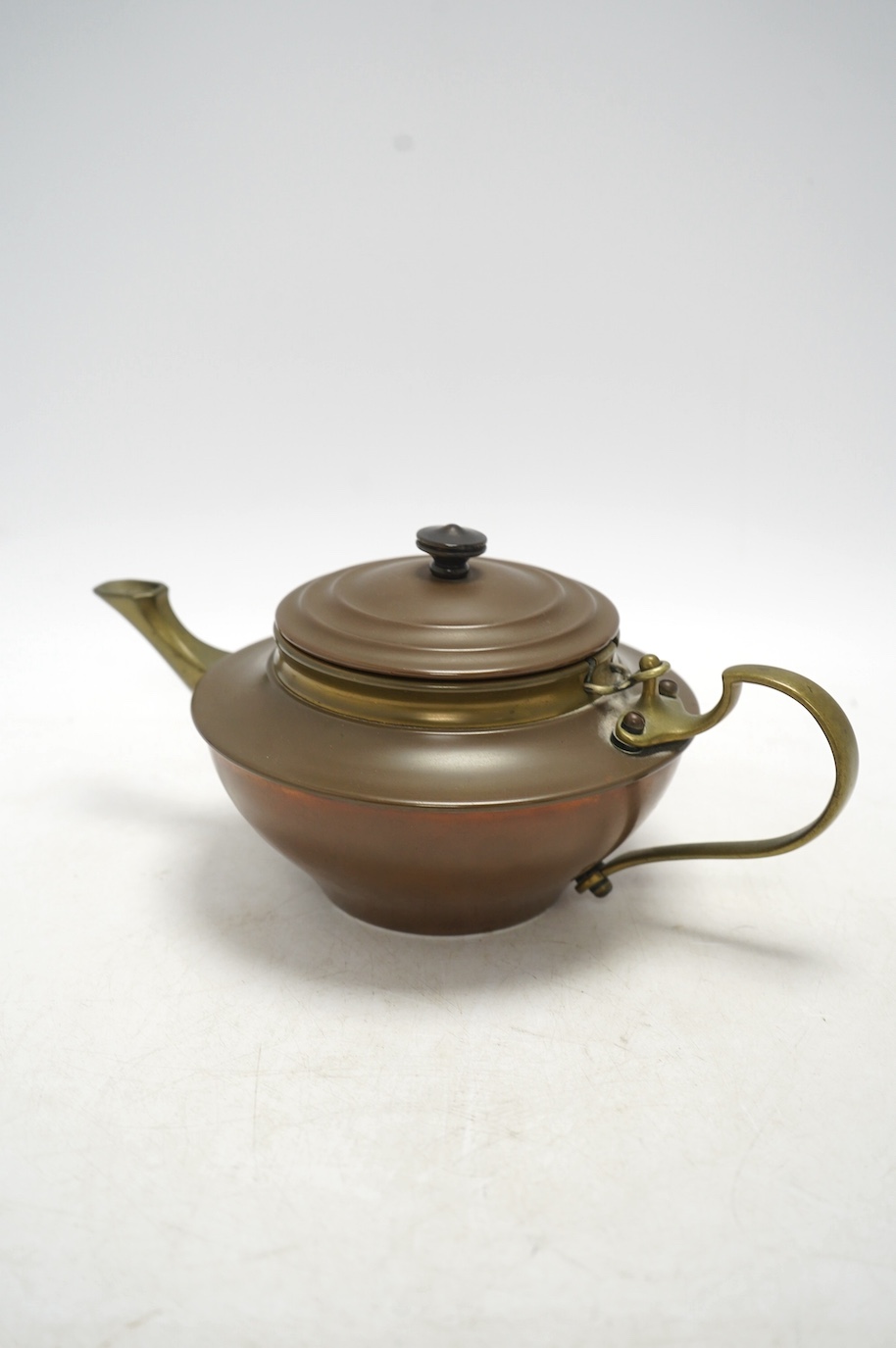 An Arts & Crafts W A S Benson teapot, 11cm high. Condition - fair